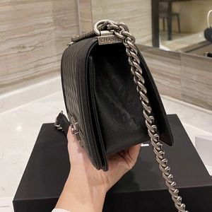 Chanel black caviar bag